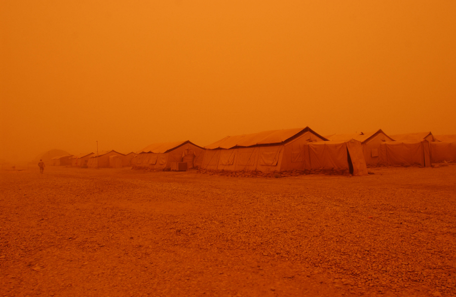 1. The Strong, Dry Desert
                            Wind Blows Huge Clouds of Sand Creating a
                            Hovering Sandstorm Which Changes the Color
                            of the Entire Area, Including the Sky, Into
                            a Surreal Orange Color (Tints of Orange),
                            May 5, 2005, Tallil Air Base, Al Jumhuriyah
                            al Iraqiyah - Republic of Iraq. Photo
                            Credit: Staff Sgt. Darcie Ibidapo, United
                            States Air Force (USAF, http://www.af.mil);
                            DefenseLINK News Photos
                            (http://www.DefenseLink.mil/photos/,
                            050505-F-4903I-191), United States
                            Department of Defense (DoD,
                            http://www.DefenseLink.mil or
                            http://www.dod.gov), Government of the
                            United States of America (USA).