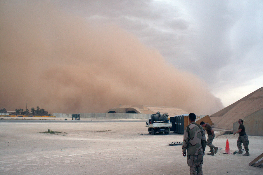 6. In Broad Daylight this Sandstorm, an
                            Enormous Mountain of Sand and an Awesome
                            Display of Nature's Wind Power, Approaches
                            the Base and Engulfs the Hardened Aircraft
                            Shelter, May 21, 2007, Al Asad, Al Anbar
                            Province, Al Jumhuriyah al Iraqiyah -
                            Republic of Iraq Photo Credit: Senior Chief
                            Aviation Structural Mechanic Andrew Stack,
                            United States Marine Corps (USMC,
                            http://www.usmc.mil); Navy NewsStand - Eye
                            on the Fleet Photo Gallery
                            (http://www.news.navy.mil/view_photos.asp,
                            070521-N-0000X-021), United States Navy
                            (USN, http://www.navy.mil), United States
                            Department of Defense (DoD,
                            http://www.DefenseLink.mil or
                            http://www.dod.gov), Government of the
                            United States of America (USA).