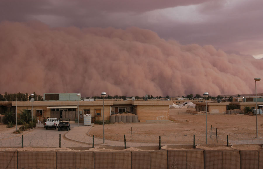 7. A Spectacular and Ominous View of an
                            Approaching Sandstorm, an Unstoppable,
                            Gigantic, Rolling Wall of Sand Between 4,000
                            and 5,000 Feet In Height, April 26, 2005, Al
                            Asad, Al Anbar Province, Al Jumhuriyah al
                            Iraqiyah - Republic of Iraq. Photo Credit:
                            Gunnery Sgt. Shannon Arledge, 2nd Marine
                            Aircraft Wing, USMC; Official Photo Archive
                            - U.S. Marine Corps, Photo ID#
                            :2005426141735 and 20050426-M-0502A-018,
                            Marine Corps Photo Gallery
                            (http://www.usmc.mil/marinelink/image1.nsf/imagearchive),
                            United States Marine Corps (USMC,
                            http://www.usmc.mil), United States
                            Department of Defense (DoD,
                            http://www.DefenseLink.mil or
                            http://www.dod.gov), Government of the
                            United States of America (USA). See the
                            Marine Corps News story 'Dust in the wind: A
                            wall of sand moves through Al Asad' by USMC
                            Gunnery Sgt. Shannon Arledge, 2nd Marine
                            Aircraft Wing, April 26, 2005 (Story ID#:
                            2005426134811,
http://www.usmc.mil/marinelink/mcn2000.nsf/lookupstoryref/2005426134811).