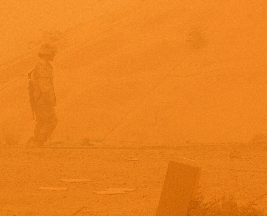 11. A United States Army Soldier (42nd
                            Infantry Division) Conducts a Post-Attack
                            Reconnaissance Sweep During a Big Sandstorm,
                            July 14, 2005, Balad Air Base, Al Jumhuriyah
                            al Iraqiyah - Republic of Iraq. Photo
                            Credit: Staff Sgt. (SSgt) Chad Chisholm,
                            United States Air Force (USAF,
                            http://www.af.mil); Army Images
                            (http://www4.army.mil/armyimages, U.S. Army
                            Image ID: CSA-2005-07-22-091514), USAF Image
                            ID: 050714-F-9209C-002; Photo Courtesy of
                            United States Army (U.S. Army,
                            http://www.army.mil), United States
                            Department of Defense (DoD,
                            http://www.DefenseLink.mil or
                            http://www.dod.gov), Government of the
                            United States of America (USA).