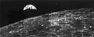 This historic image is the first view of Earth taken by a spacecraft from the vicinity of the Moon.