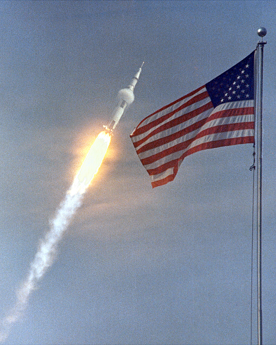 1. The flight of Apollo 11, the first Lunar landing mission. The Apollo 11 Saturn V space vehicle, or rocket, lifted off with astronauts Neil A. Armstrong, Michael Collins and Edwin E. Aldrin, Jr., at 9:32 a.m. EDT July 16, 1969, from Kennedy Space Center's Launch Complex 39A. Flying at transonic speeds -- speeds varying near and at the speed of sound (supersonic) -- can generate impressive condensation clouds caused by the Prandtl-Glauert Singularity. For a scientific explanation, see Professor M. S. Cramer's Gallery of Fluid Mechanics, Prandtl-Glauert Singularity at <http://www.GalleryOfFluidMechanics.com/conden/pg_sing.htm>; and Foundations of Fluid Mechanics, Navier-Stokes Equations Potential Flows: Prandtl-Glauert Similarity Laws at <http://www.Navier-Stokes.net/nspfsim.htm>. Photo Credit: Apollo 11 Launch, July 16, 1969, GRIN (http://grin.hq.nasa.gov) Database Number: GPN-2000-000627, National Aeronautics and Space Administration (NASA, http://www.nasa.gov), Government of the United States of America.